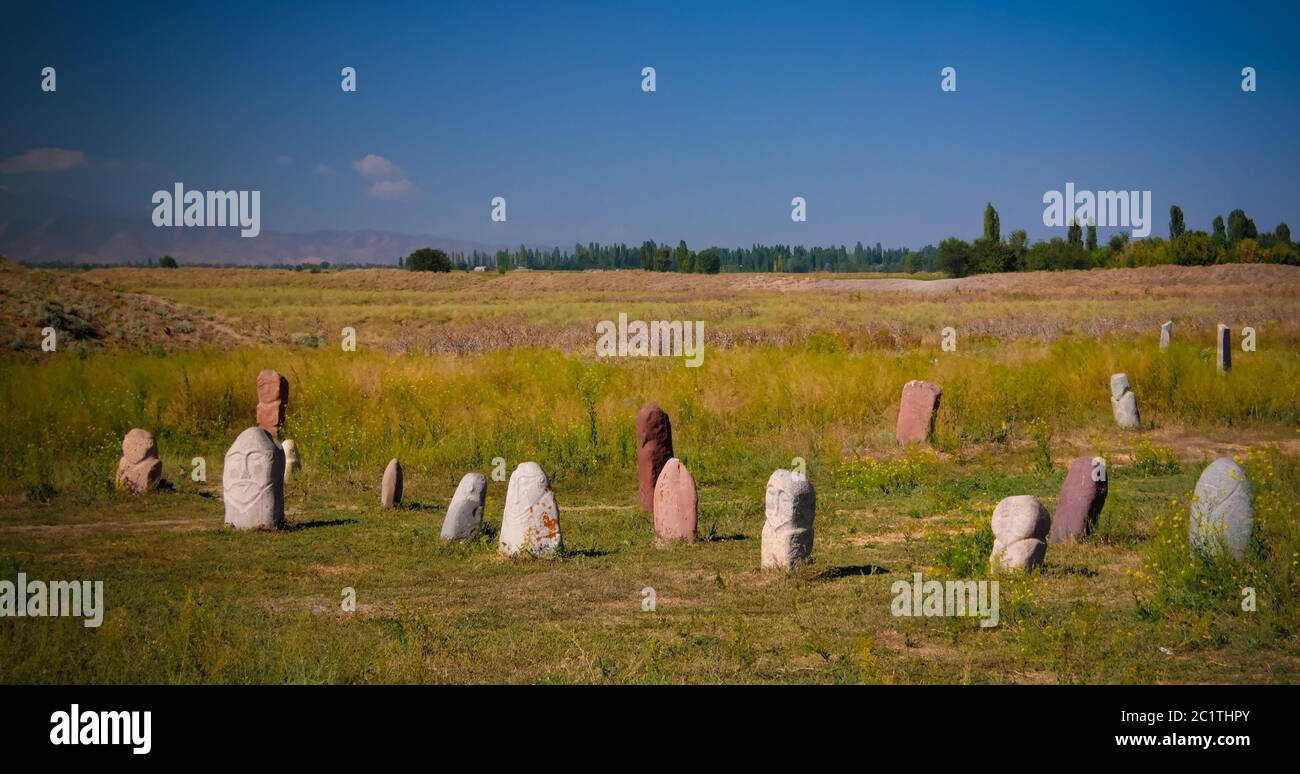Kurgan stelae aka Balbals near the Berana tower, Tokmok,Chuy Valley Kyrgyzstan Stock Photo