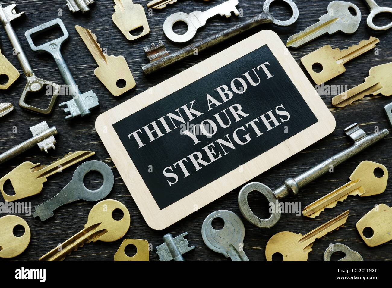 Think about your strengths phrase and old metal keys. Stock Photo