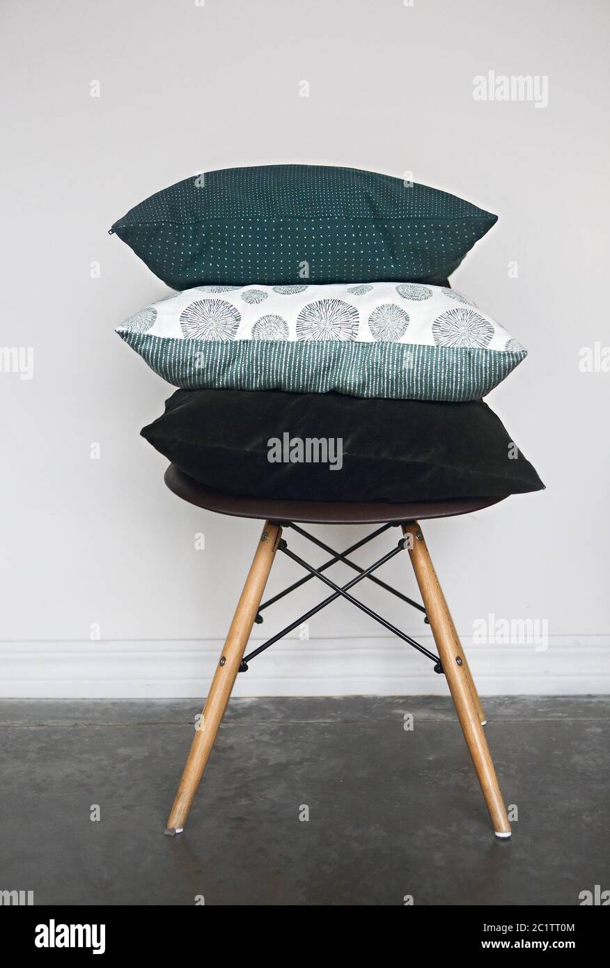 Green pillows on the chair Stock Photo