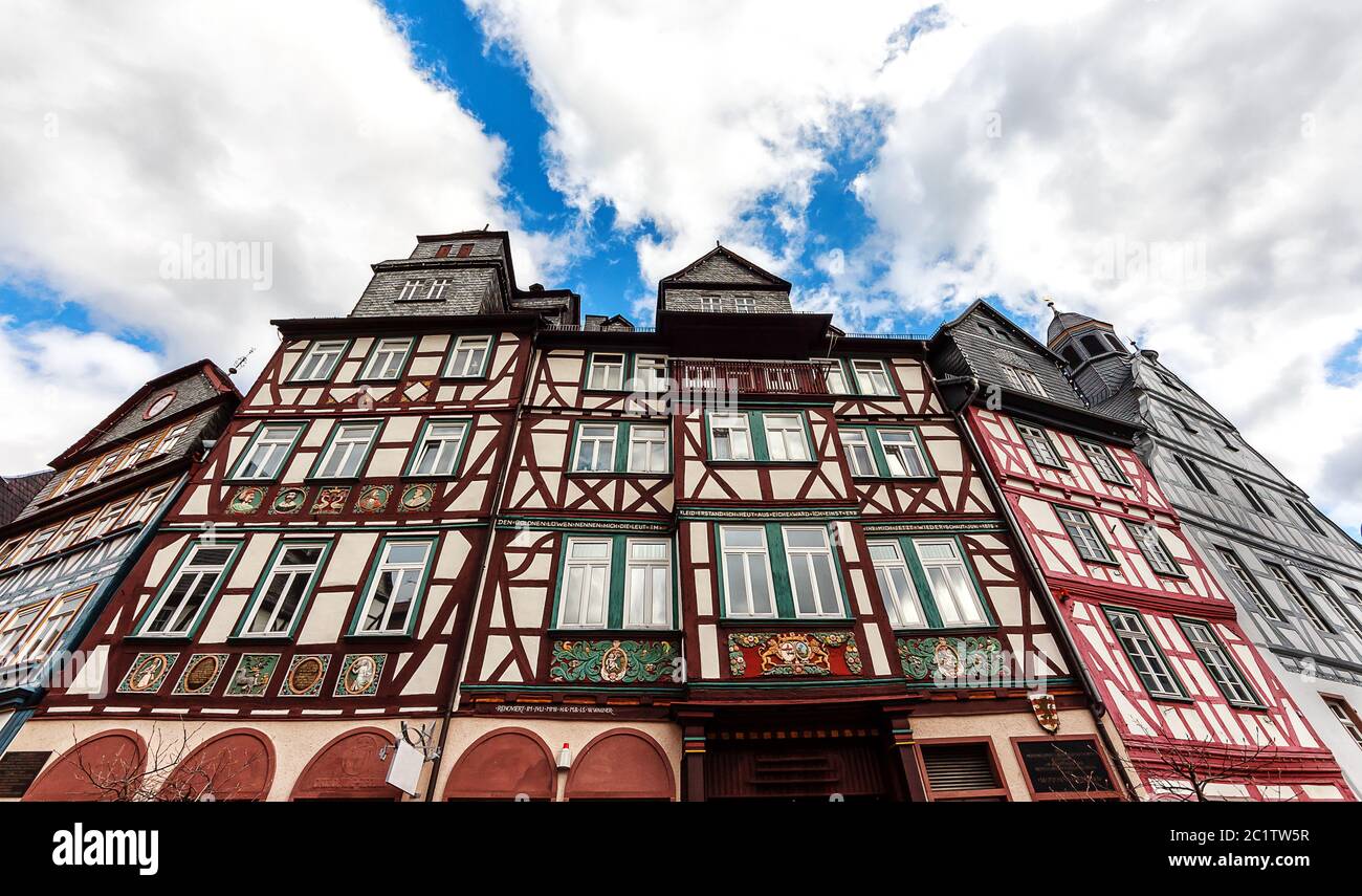 A row of picturesque timber-framed historic buildings on the market square in Butzbach, Hesse, Germany Stock Photo