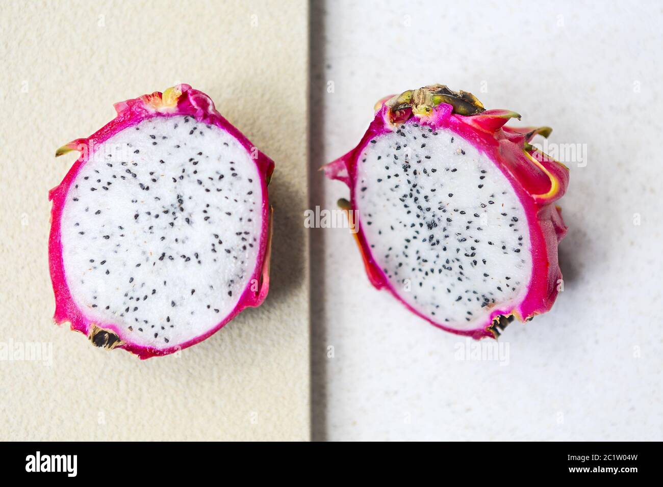 Sliced dragon fruit on the light background. Close up Stock Photo