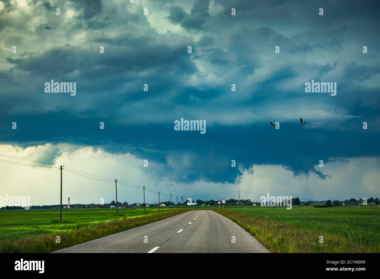 Supercell storm clouds with wall cloud and intense rain Stock Photo - Alamy