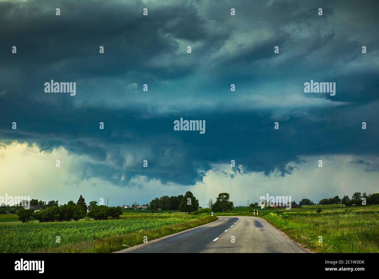 Supercell storm clouds with wall cloud and intense rain Stock Photo - Alamy