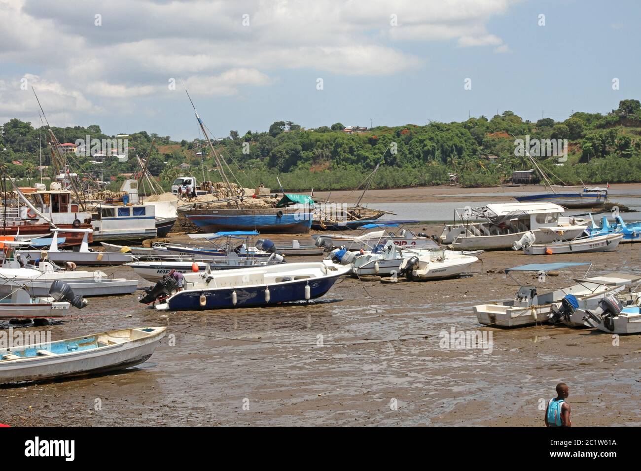 Beached boats in Andoany Harbour or Hell-Ville Harbour, Nosy Be, Madagascar. Stock Photo
