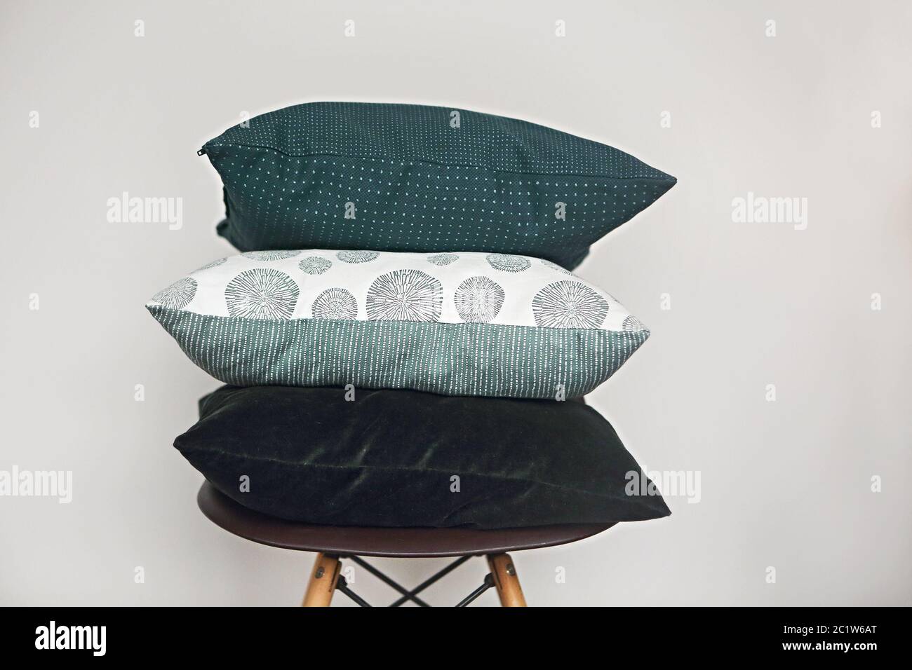 Green pillows on the chair Stock Photo