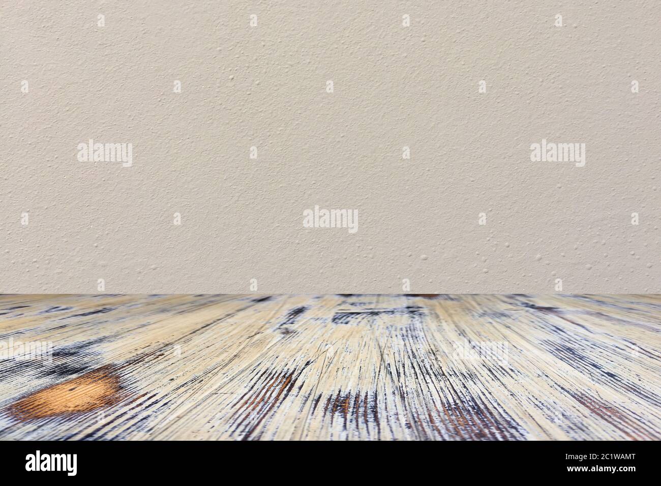 washed wood table with concrete texture background. Stock Photo