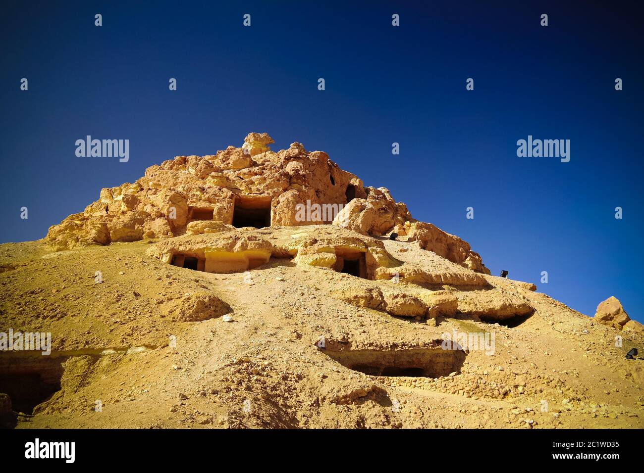 View to Gabal al-Mawta aka Mountain of the Dead, Siwa, Egypt Stock Photo