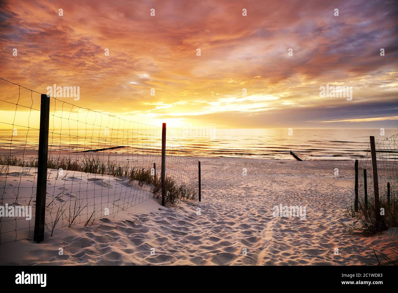 Beach entrance at a beautiful sunset Stock Photo Alamy