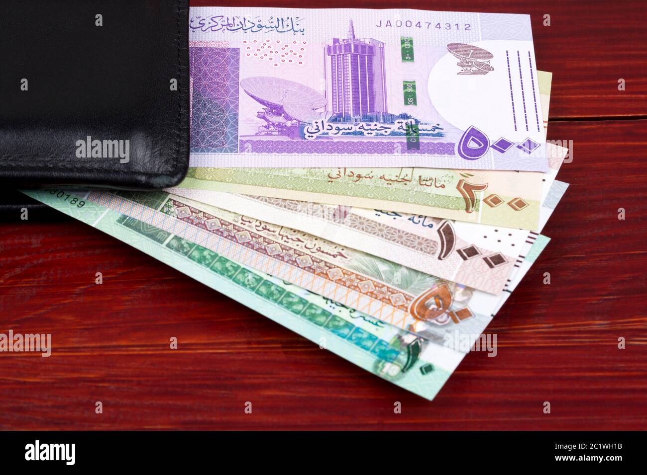 Sudanese pounds in a black wallet Stock Photo
