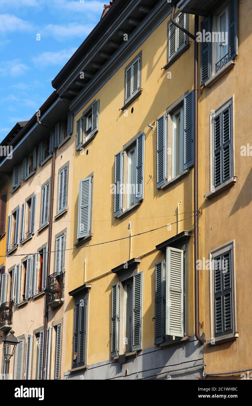 Old colorful apartment buildings of Bergamo, Italy. Stock Photo
