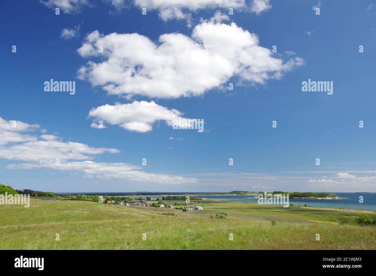 Village GroÃŸ Zicker and on the horizon Thiessow and peninsula Klein Zicker with cliff line, Baltic Sea, MÃ¶nchgut, Island of RÃ¼gen, Germany, West Europe Stock Photo