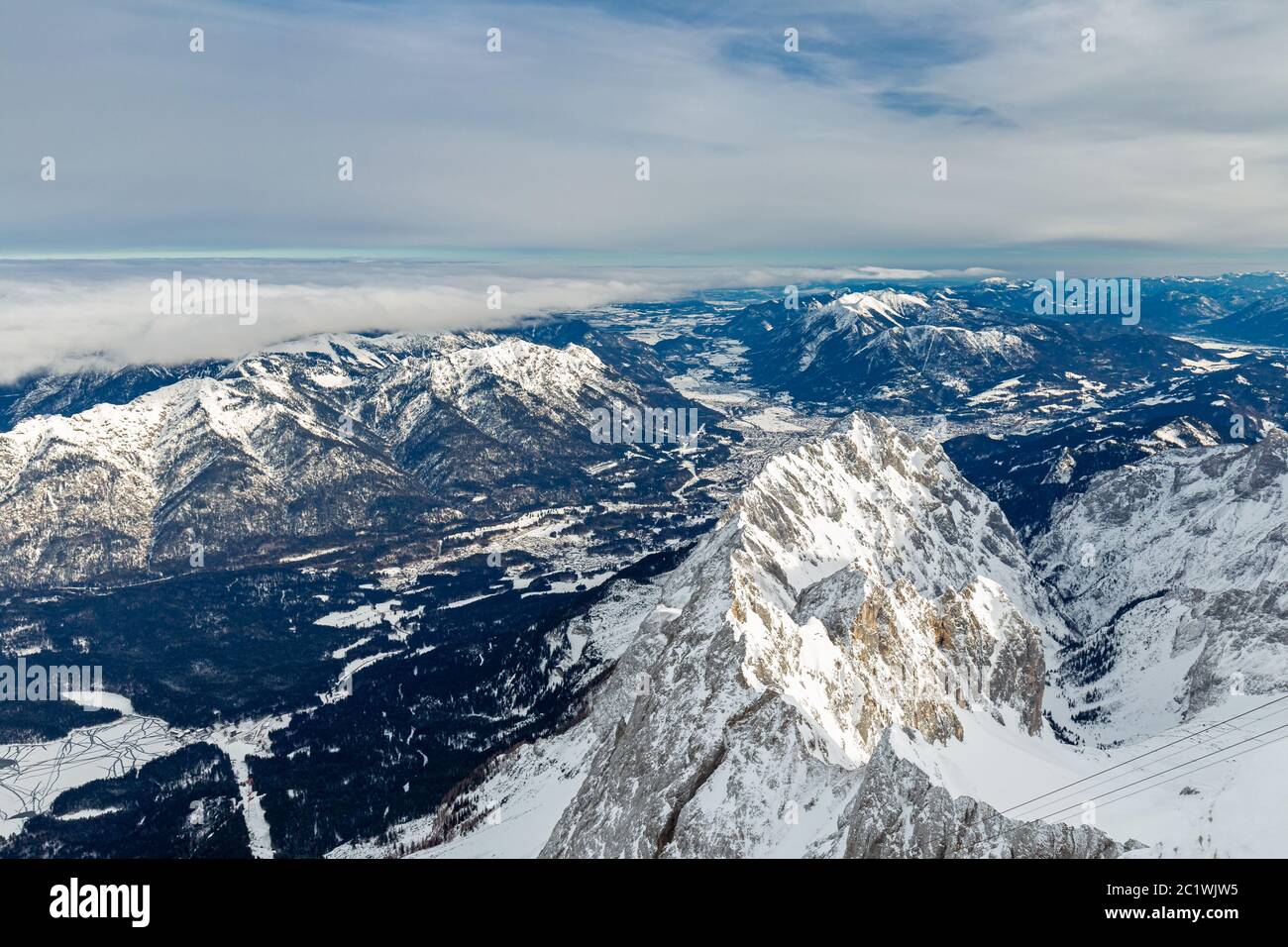 View from Zugspitze mountain summit to Garmisch Partenkirchen and Loisach river valley Stock Photo