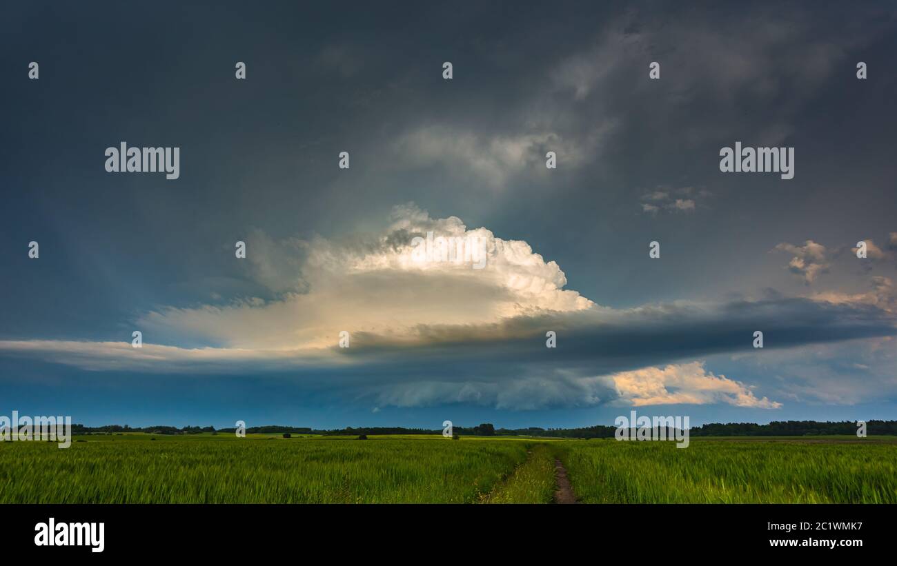 Supercell storm clouds with wall cloud and intense rain Stock Photo - Alamy