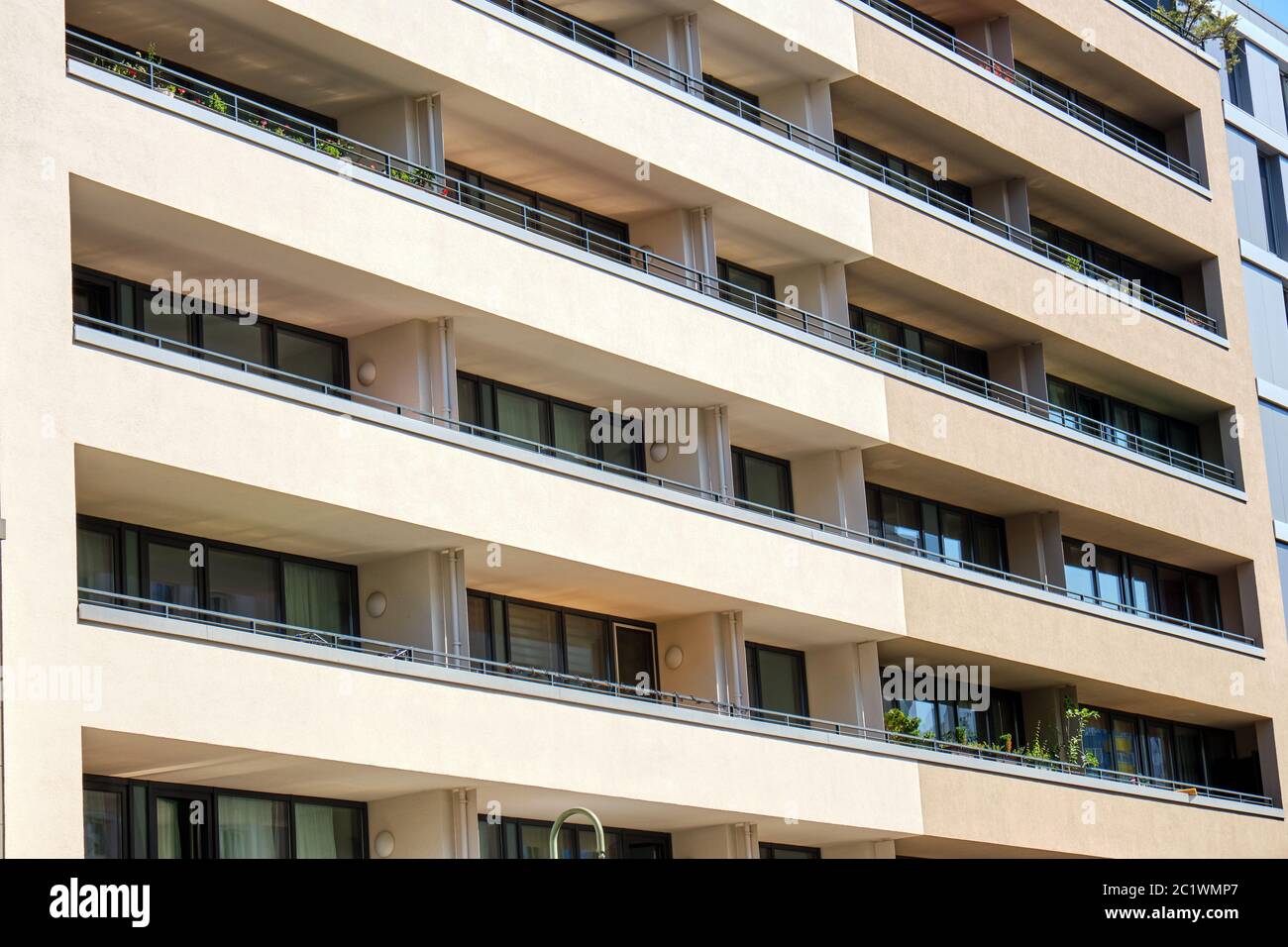 Facade of a modern apartment house with large balconies Stock Photo - Alamy