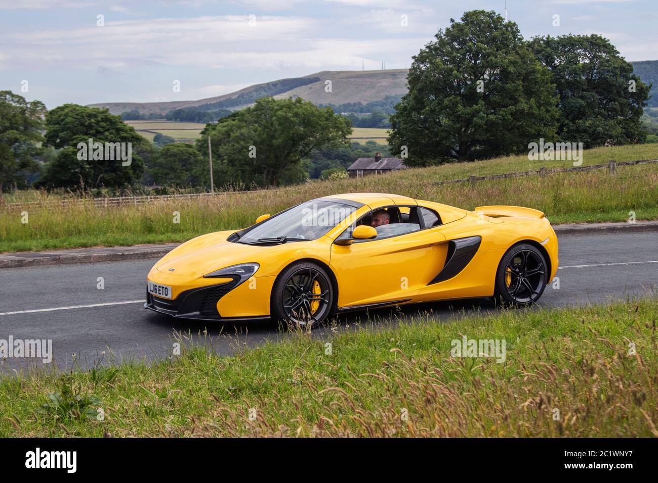 16 Yellow Mclaren 675lt Spider Vehicular Traffic Moving Vehicles Supercar Driving Vehicle On Uk Roads Stock Photo Alamy