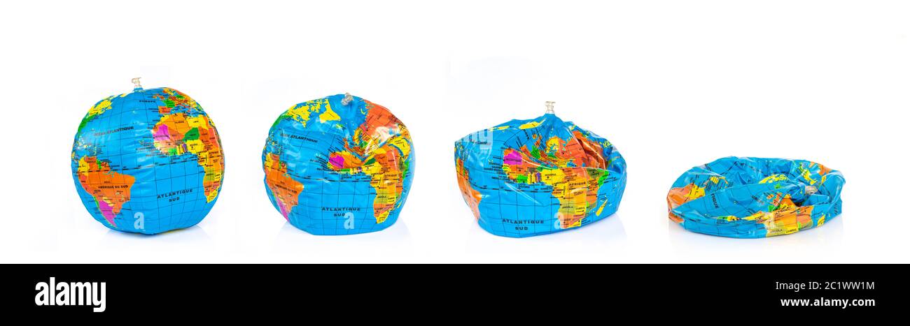 Planet earth deflating isolated on panoramic white background. Earth overshoot day, unsustainable resources consumption concept Stock Photo