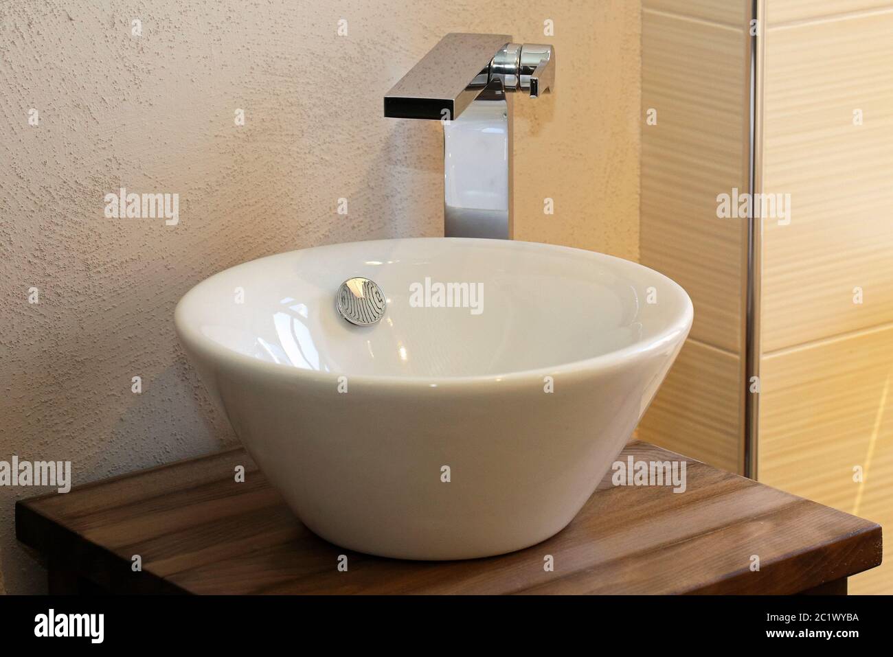 A closer look of the round soap holder in the sink inside the bathroom  Stock Photo - Alamy