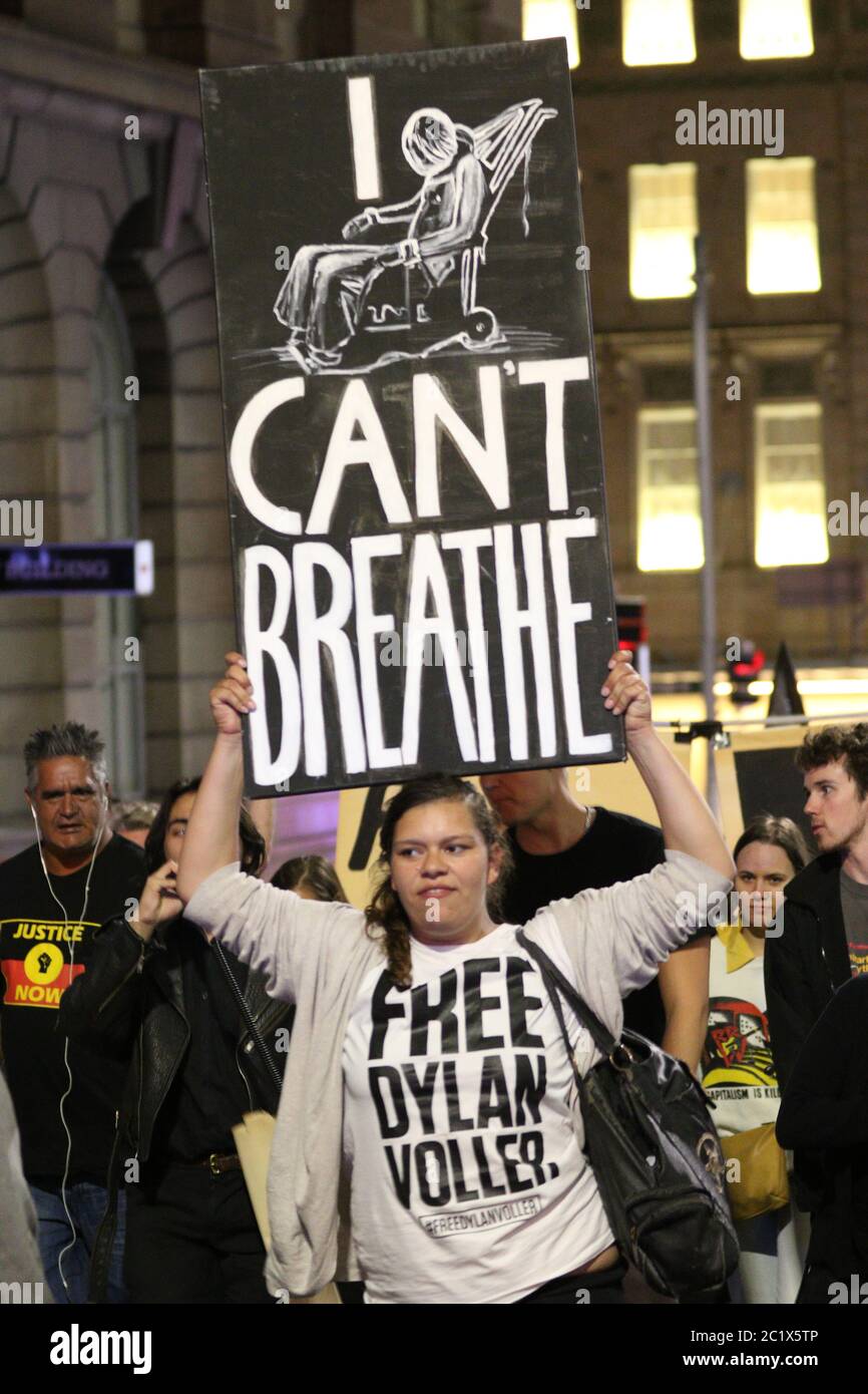 Pictured: Kirra Voller (sister of Dylan Voller) holds a sign saying, ‘I can’t breath’. Stock Photo