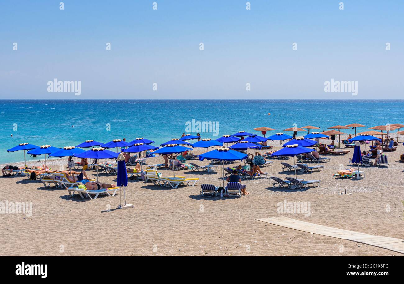 Sun loungers on Rhodes Town beach, Rhodes Island, Greece Stock Photo