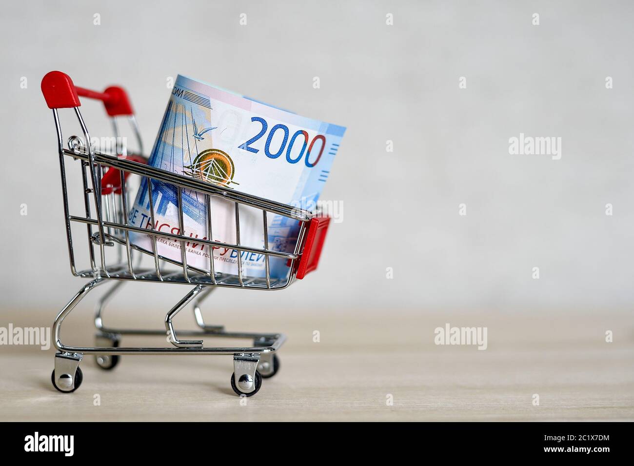 Russian money banknotes in a shopping trolley, online shopping concept. Stock Photo