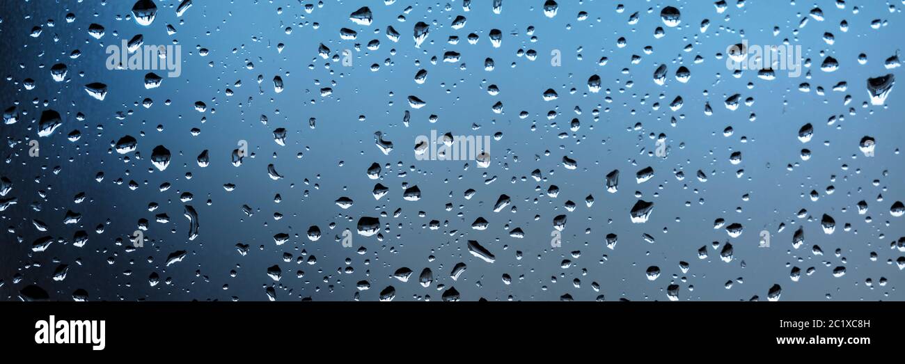 Water drops on blue background Stock Photo