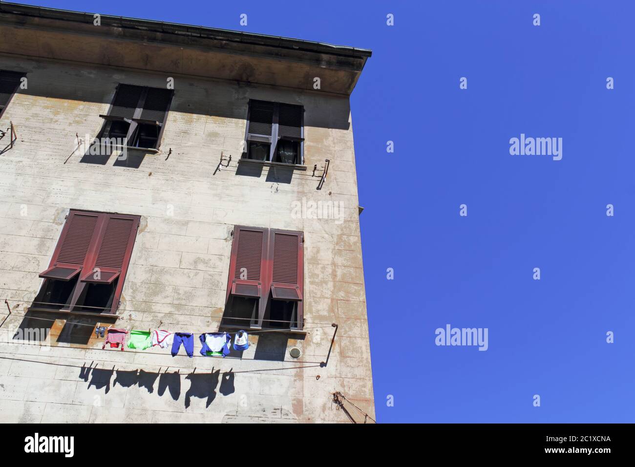 Old building with clothesline Stock Photo