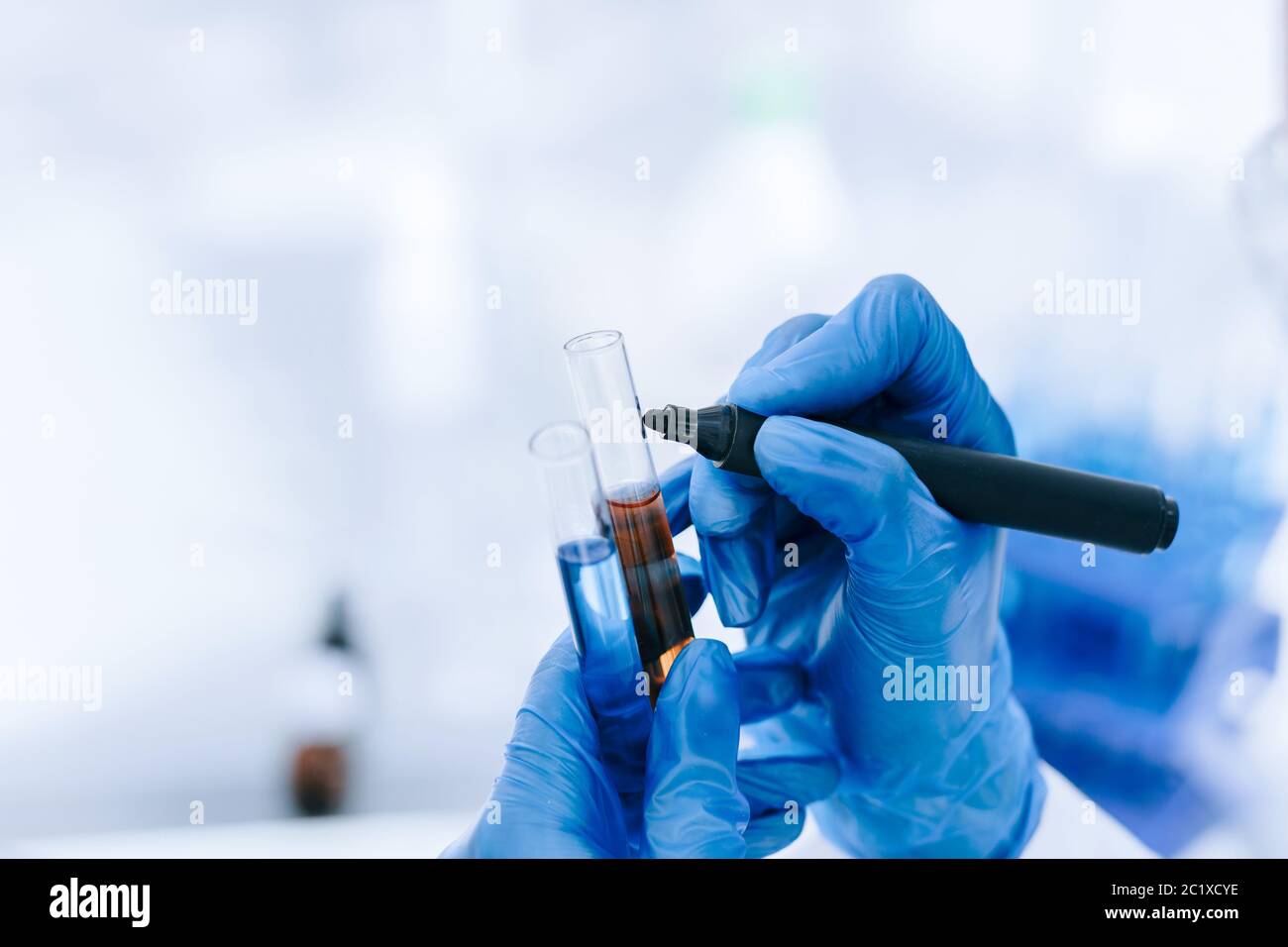 close up. scientist marks the tubes with tests. Stock Photo