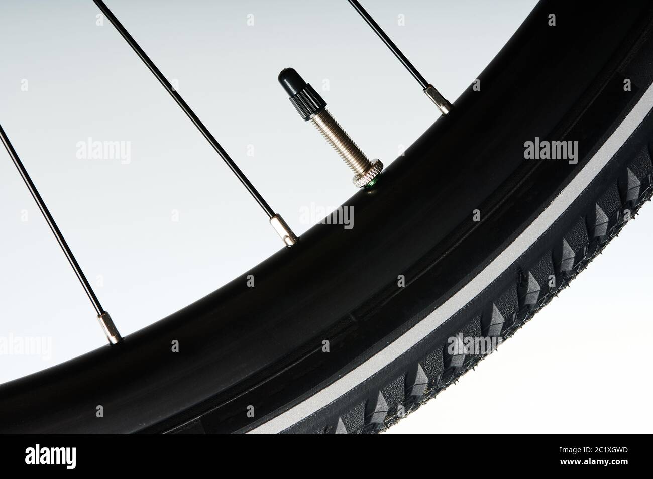 Metal nipple in bicycle wheel macro close up view isolated Stock Photo