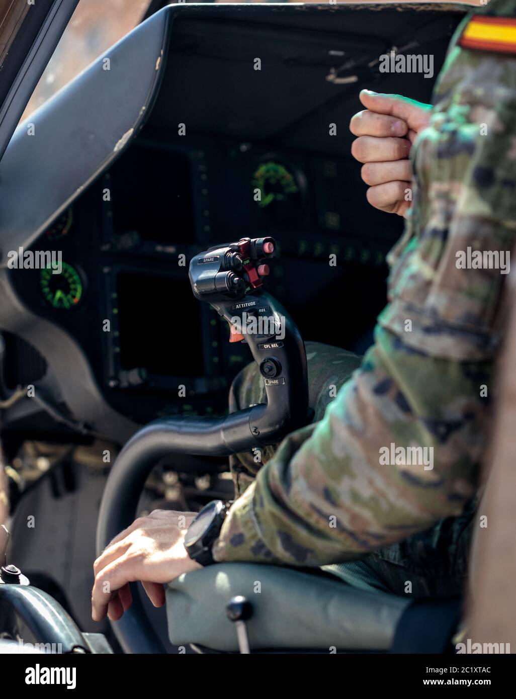 Army pilot inside cockpit of Attack Helicopter HA.28 Tiger during display of Spanish Armed Forces Day in Seville, Spain Stock Photo