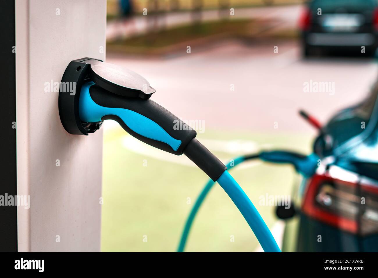 Electric vehicle charging station point, closeup of unit plug Stock ...