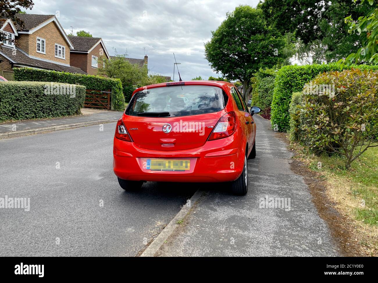 Pavement parked car britain hires stock photography and images Alamy