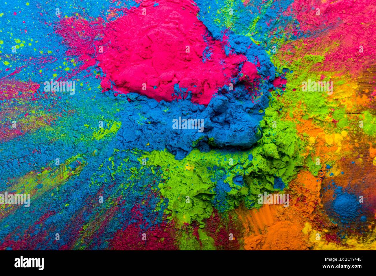 Abstract colorful Happy Holi background. Color vibrant powder on wood. Dust  colored splash texture. Flat lay holi paint decorati Stock Photo - Alamy