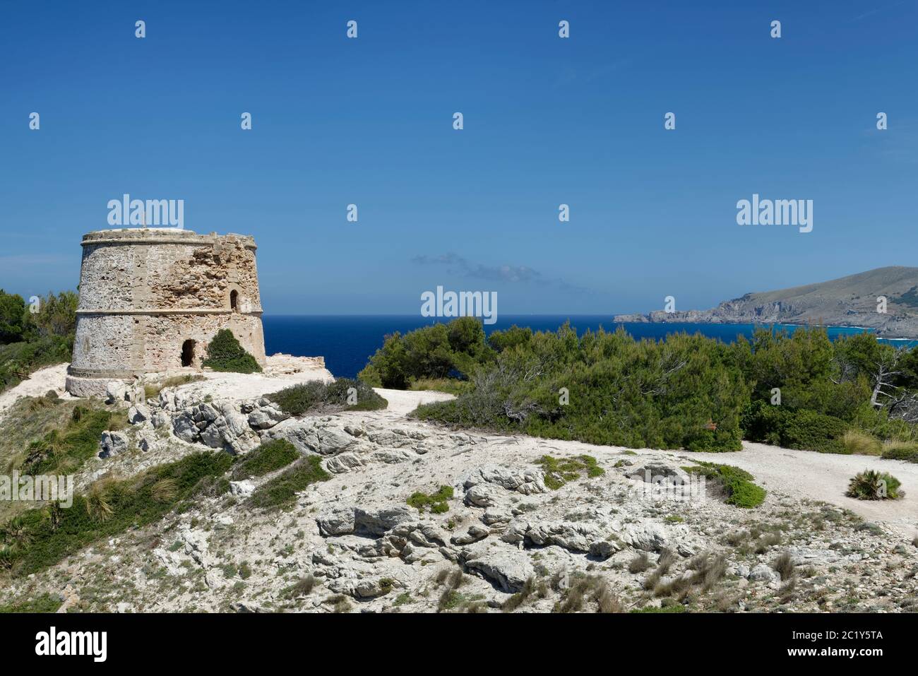 Torre D’Aubarca medieval watchtower on coastal cliff top, Llevant Peninsula Natural Park, near Arta, Mallorca east coast, May. Stock Photo