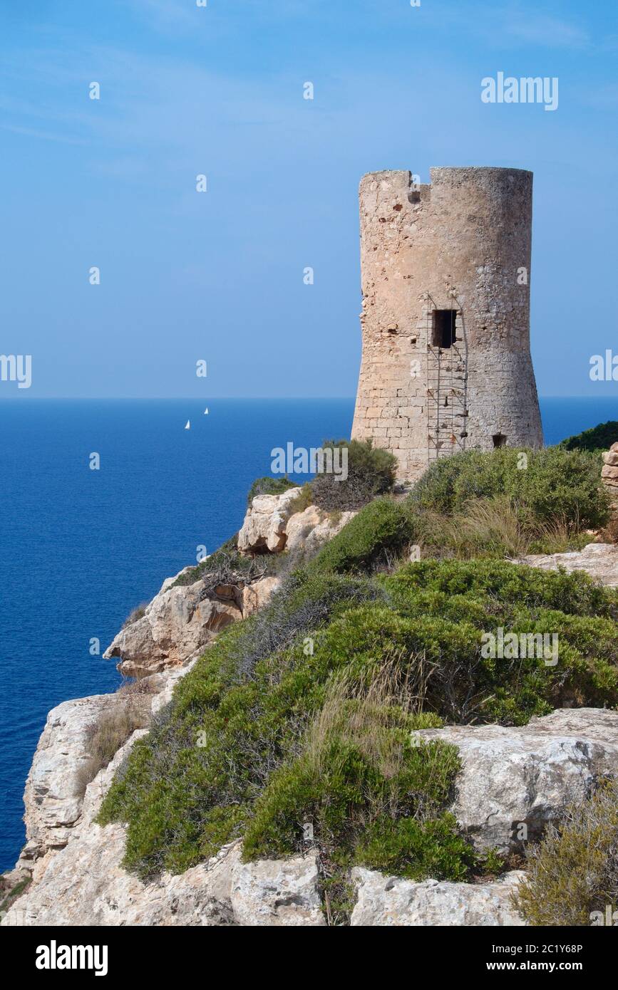 Torre Del Cap Blanc medieval watchtower, built on a coastal cliff top in 1584, near Llucmajor, Mallorca south coast, August 2018. Stock Photo