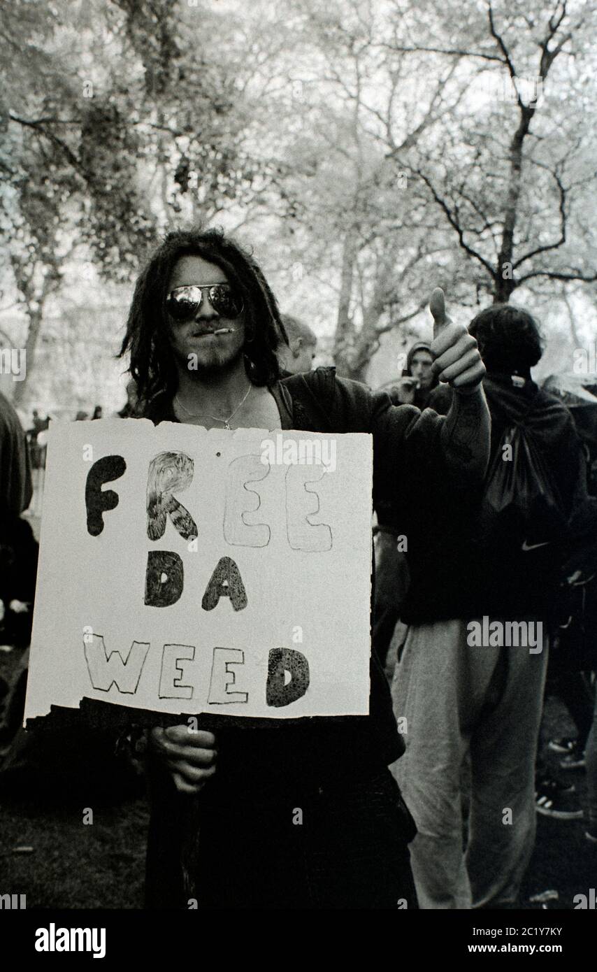 Man holding 'free da weed' placard at 420 day, London, UK. 2014 Stock Photo