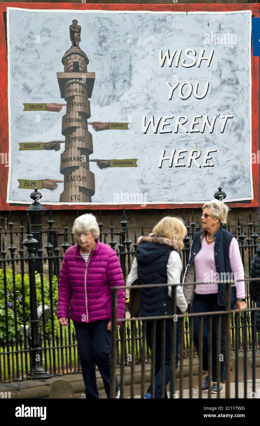 A billboard poster which features a picture of the controversial Melville Monument and features