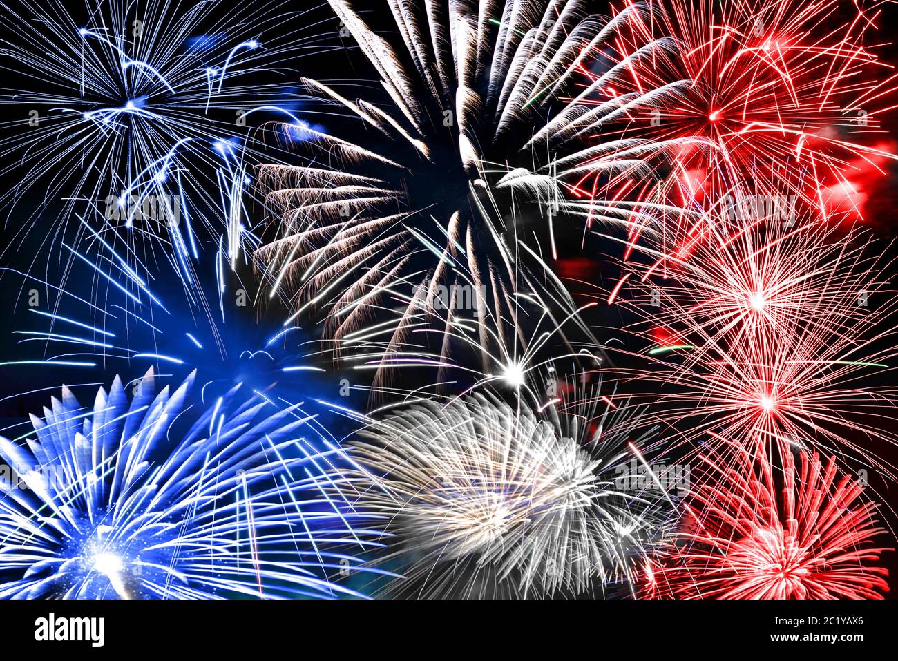 Blue white and red fireworks background Stock Photo