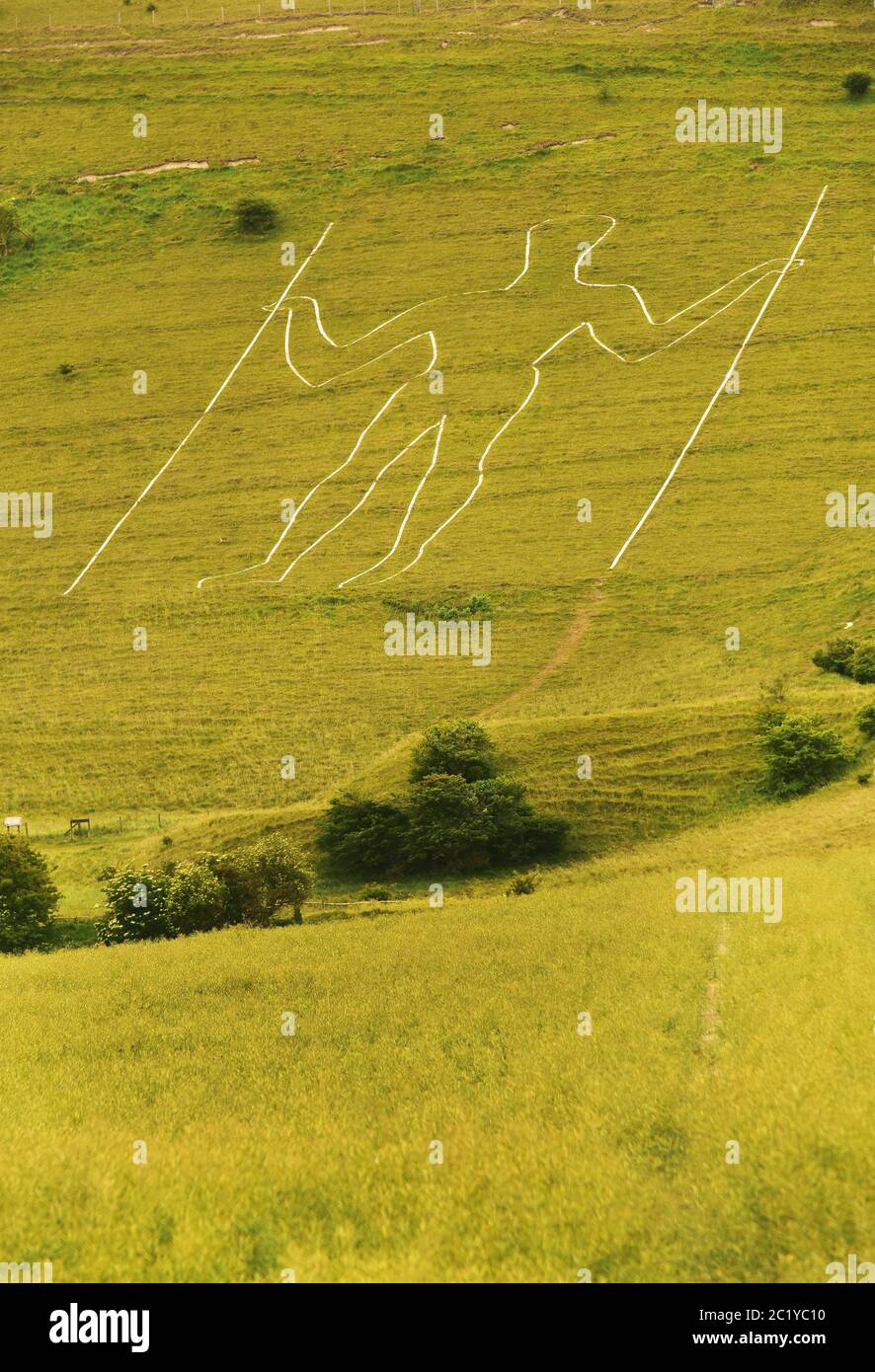 The Long Man of Wilmington Chalk Figure on a Grassy Hillside, Sussex, UK Stock Photo
