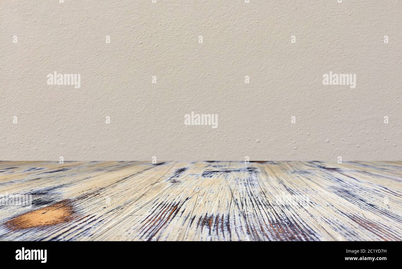 washed wood table with concrete texture background. Stock Photo