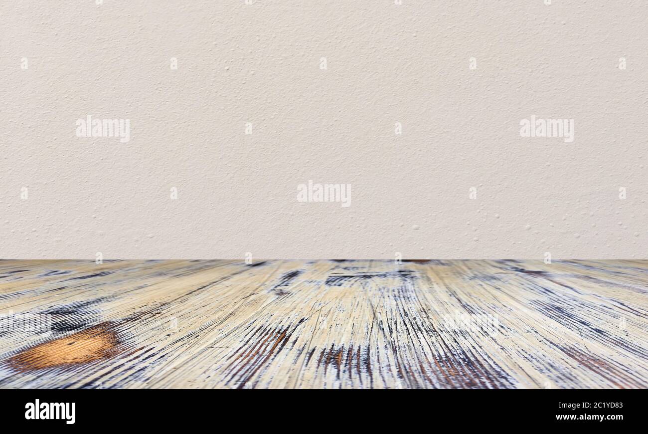 washed wood table with concrete texture background. Stock Photo
