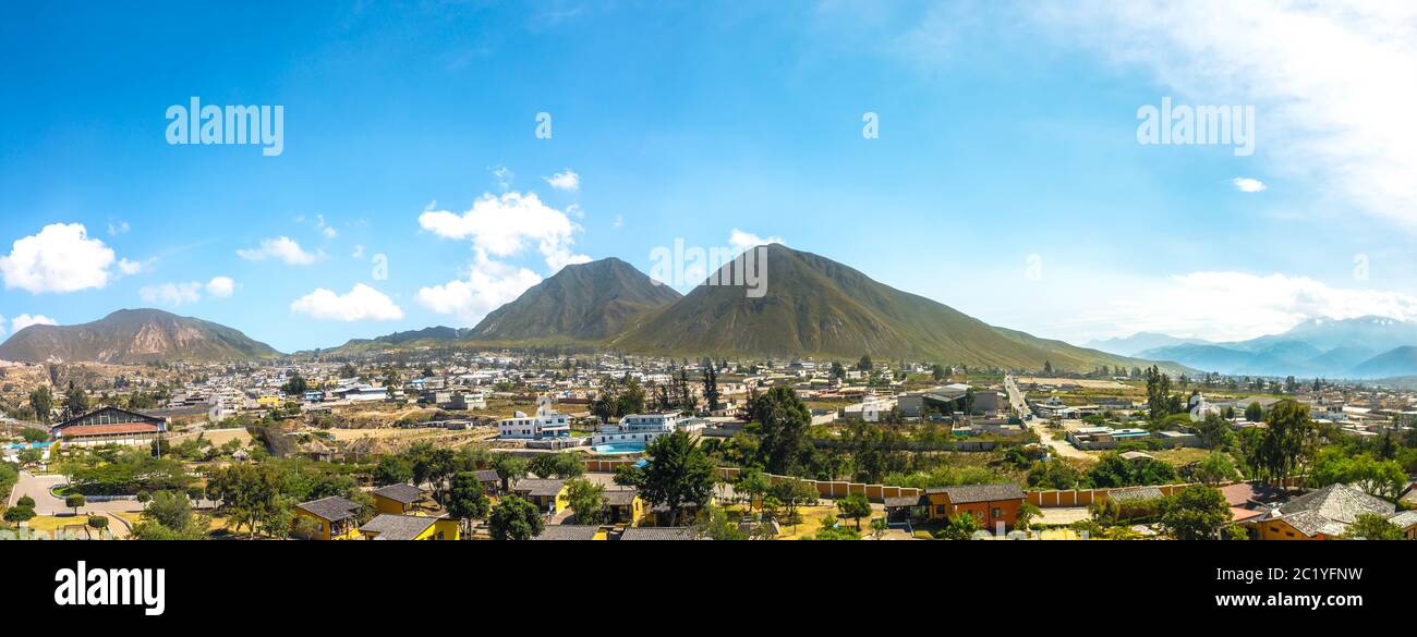 Panoramic landscape of the equator from atop the Ciudad Mitad del Mundo in Quito, Ecuador on a sunny day Stock Photo