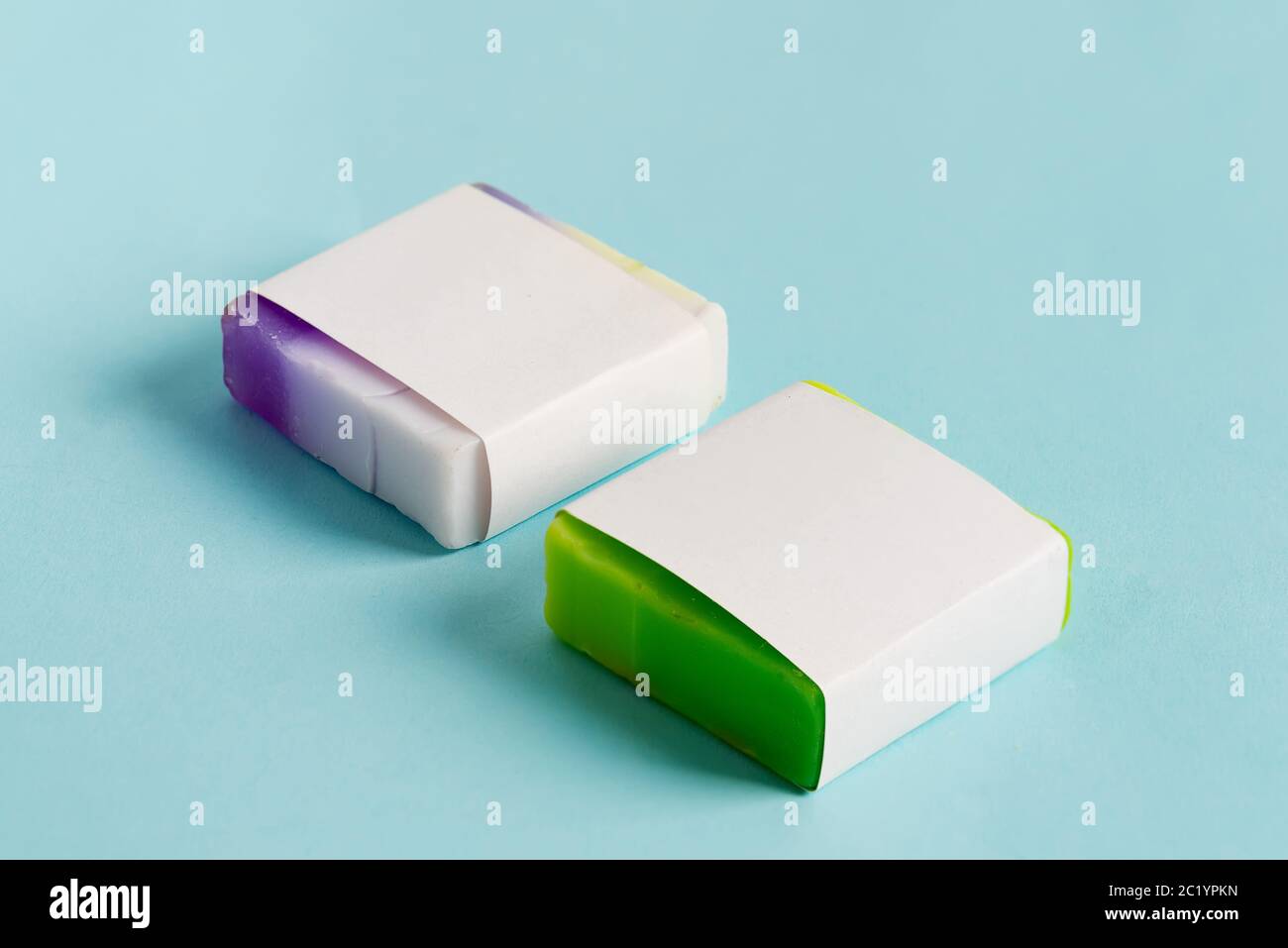 Natural cosmetic skin product handmade soap bar with paper label on a pastel blue background. Mock-up for your design and creativity. Stock Photo