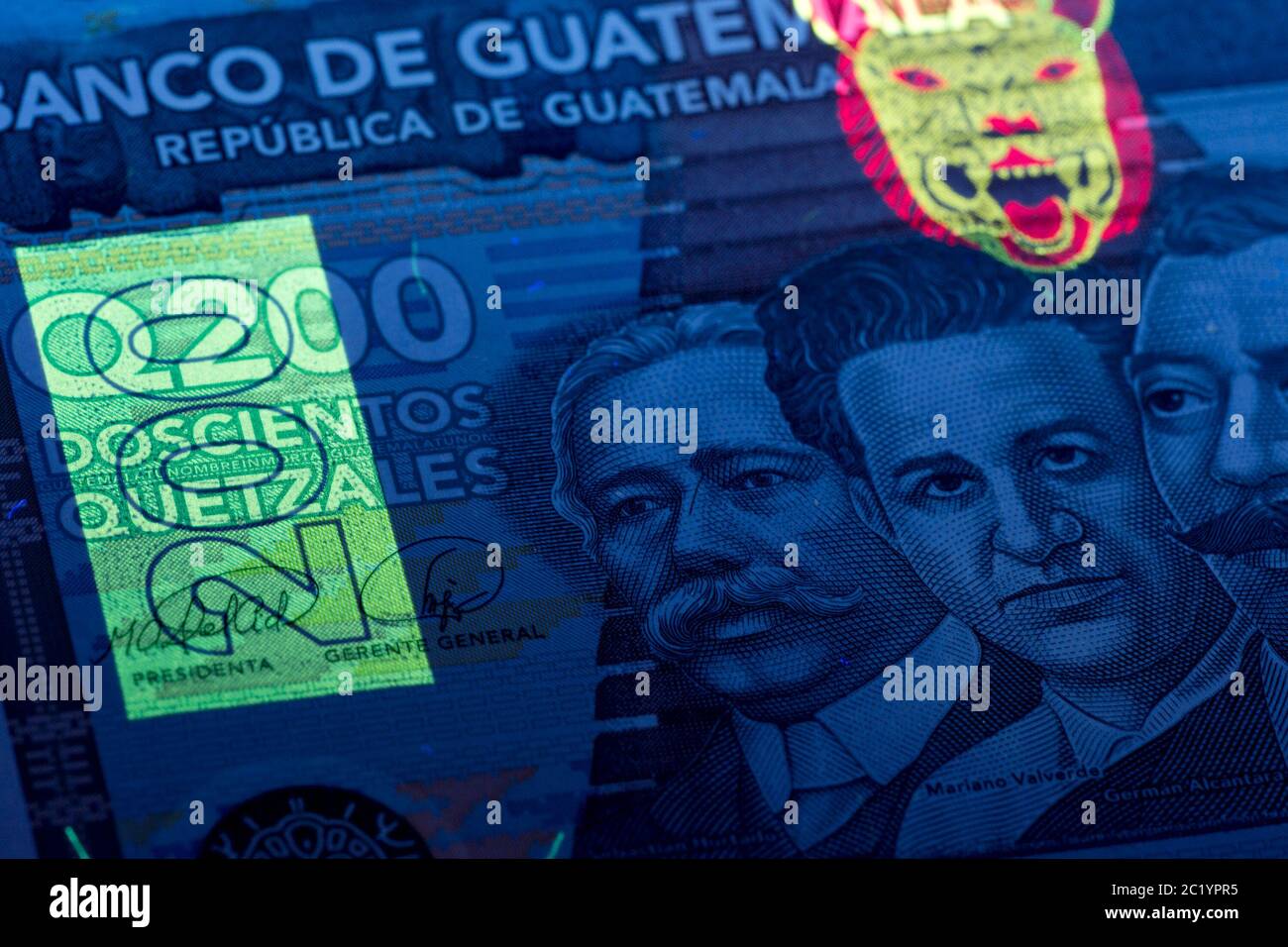 Guatemalan money in UV rays Stock Photo