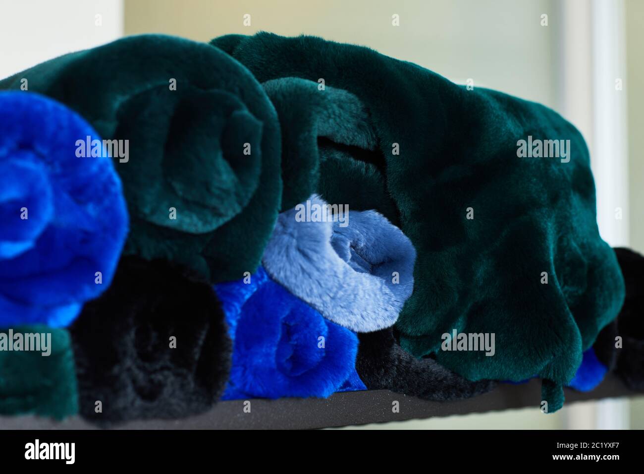different types of Artificial fur in the store. fur fabric Stock Photo
