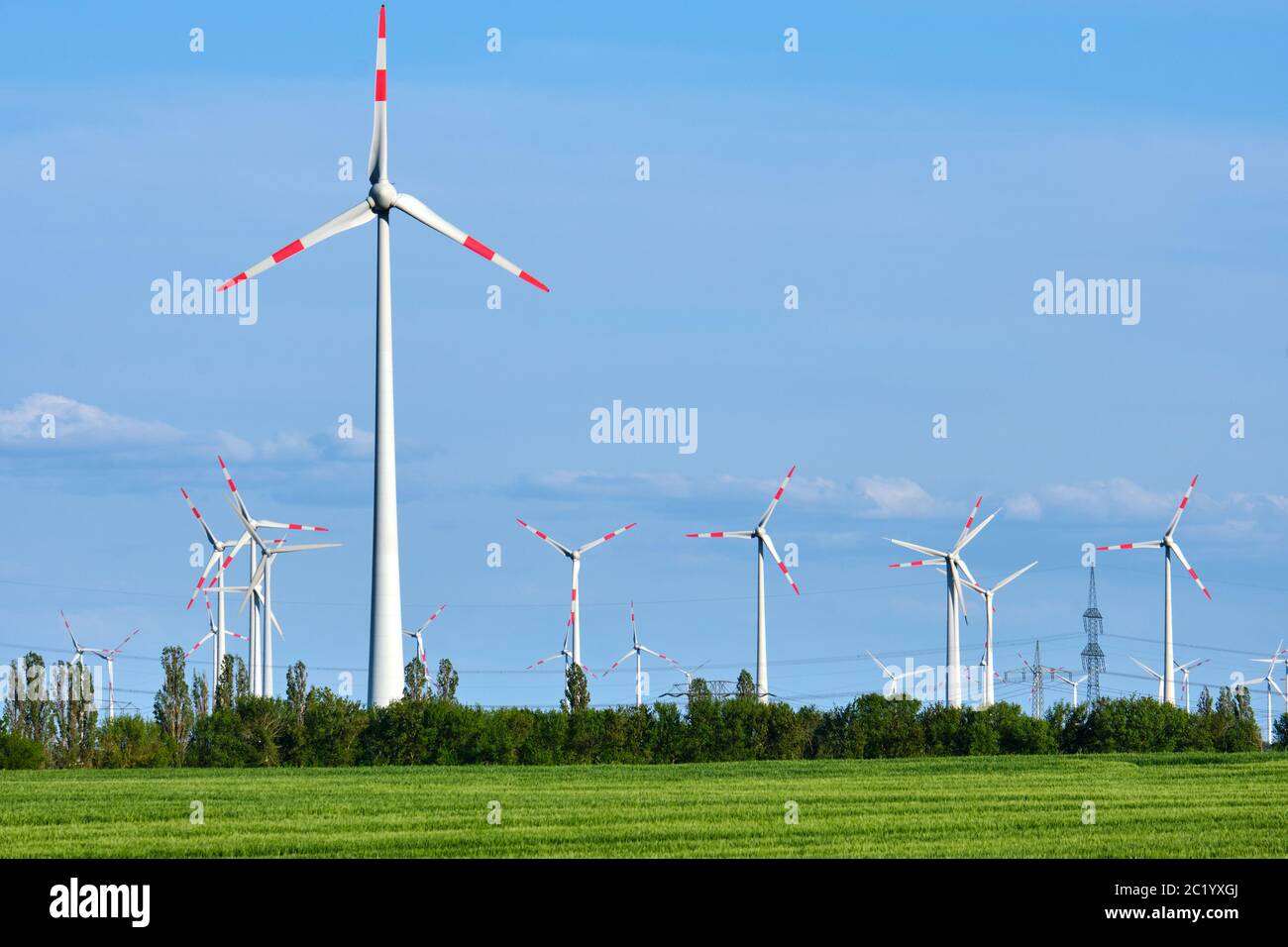 Wind energy in an agricultural area seen in Germany Stock Photo