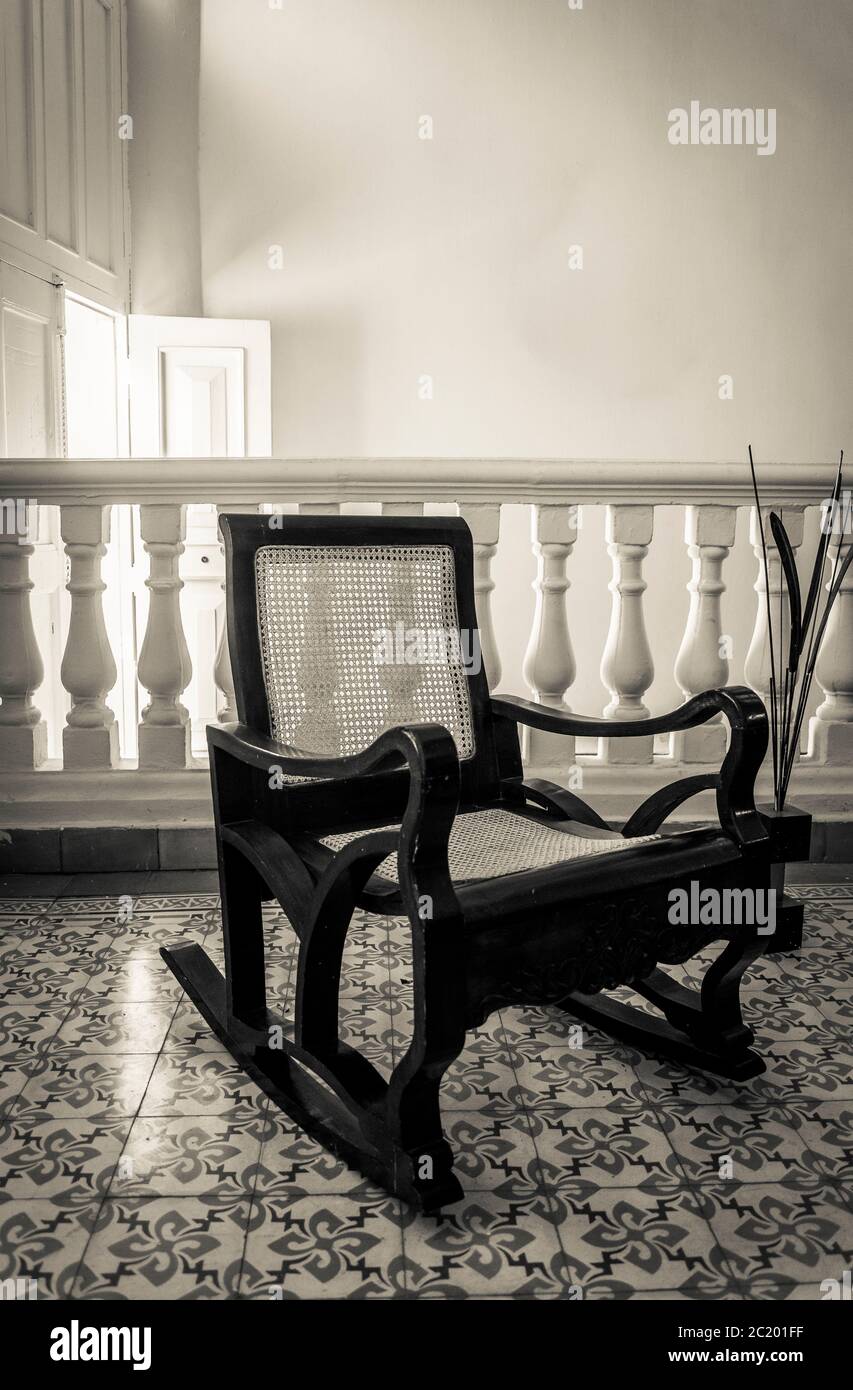 Rocking chair in a well-off, comfortable house, Santa Clara, Cuba Stock Photo