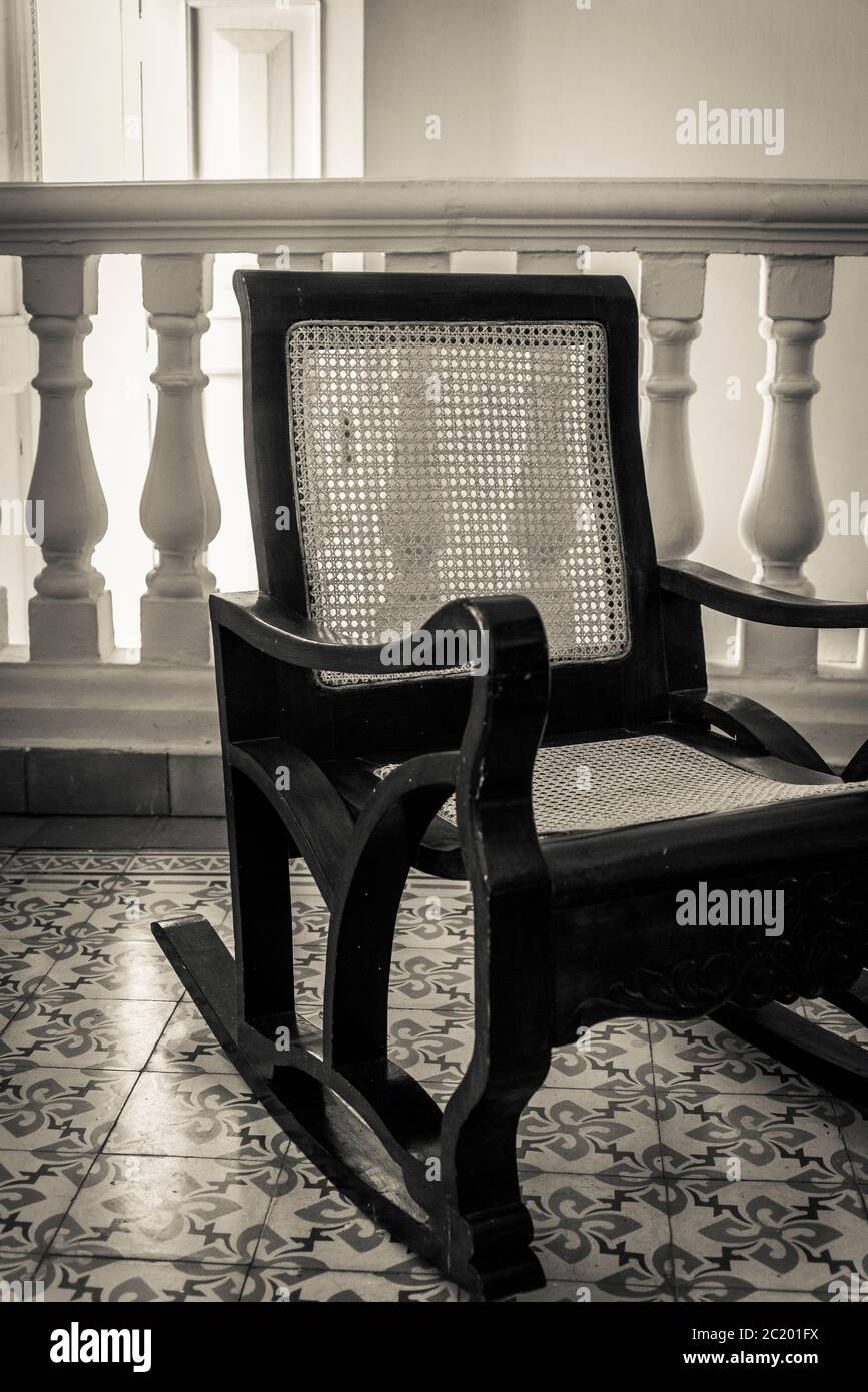 Rocking chair in a well-off, comfortable house, Santa Clara, Cuba Stock Photo