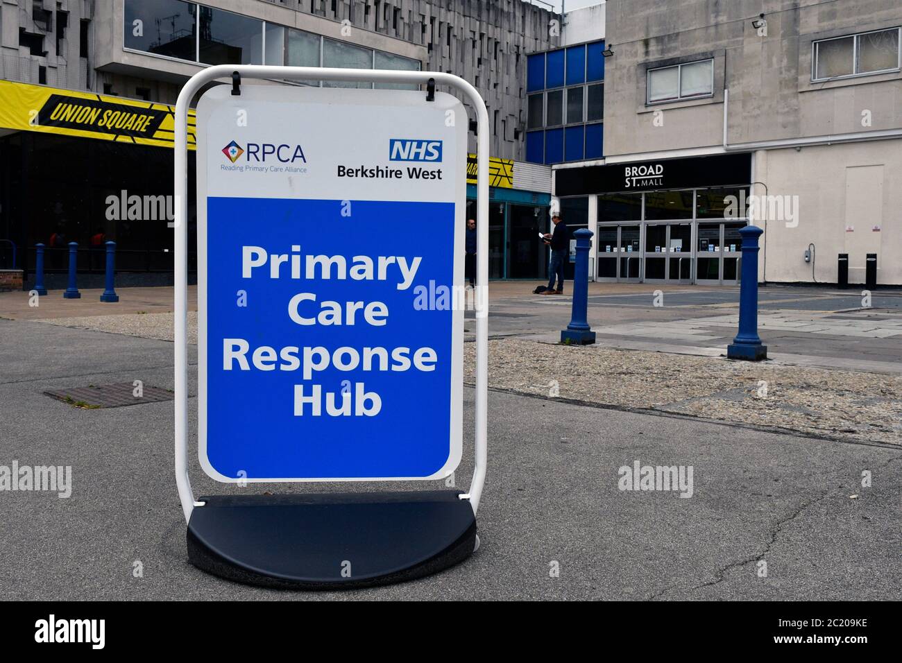 Sign indicating entrance for NHS Walk-in Centre at Broad Street Mall, now a Primary Care Response Hub for people suffering respiratory problems during Stock Photo
