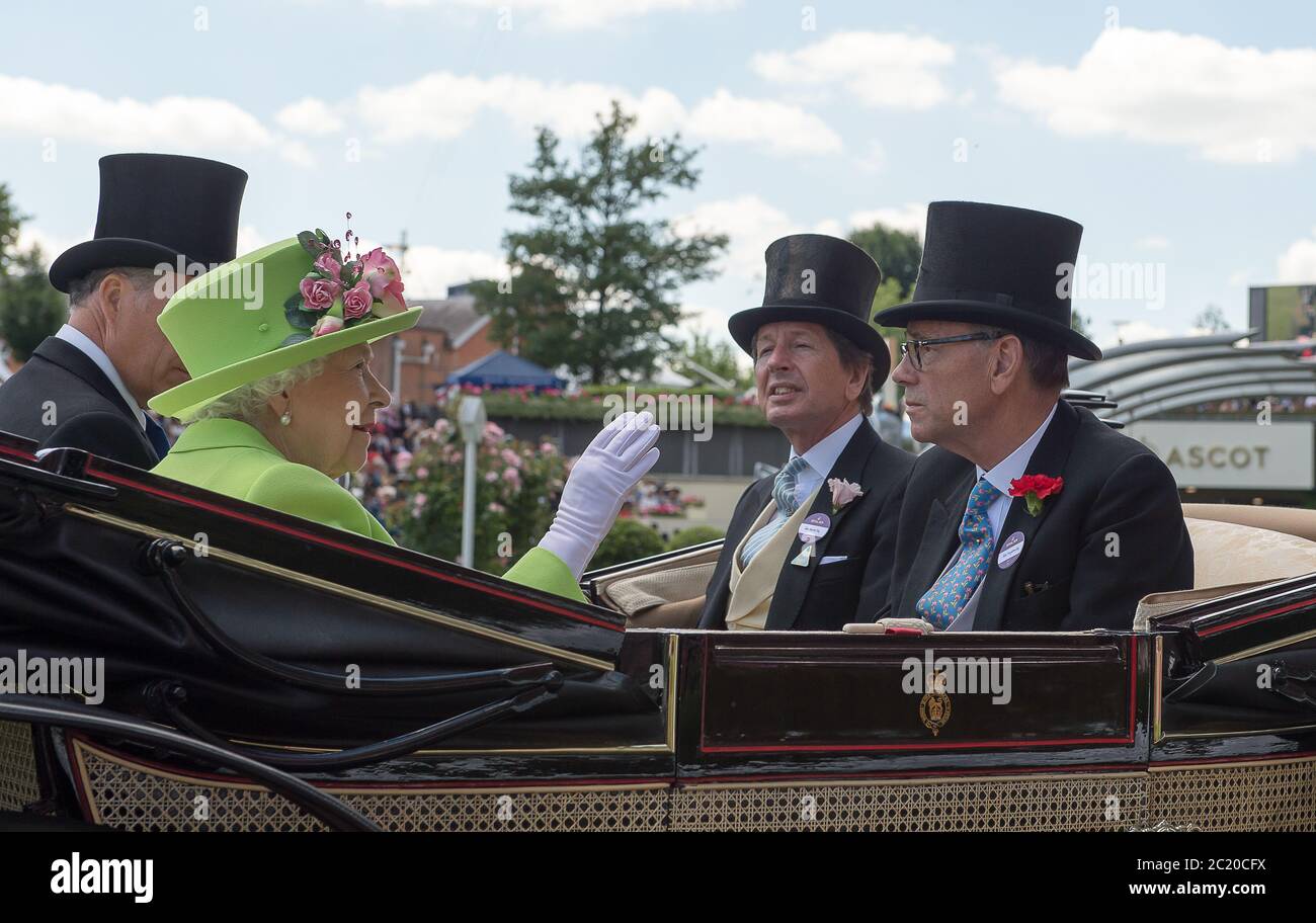 Ascot, Berkshire, UK. 22nd June, 2018. Queen Elizabeth II waves to the crowds as she arrives at Royal Ascot in a horse drawn carriage. Credit: Maureen McLean/Alamy Stock Photo