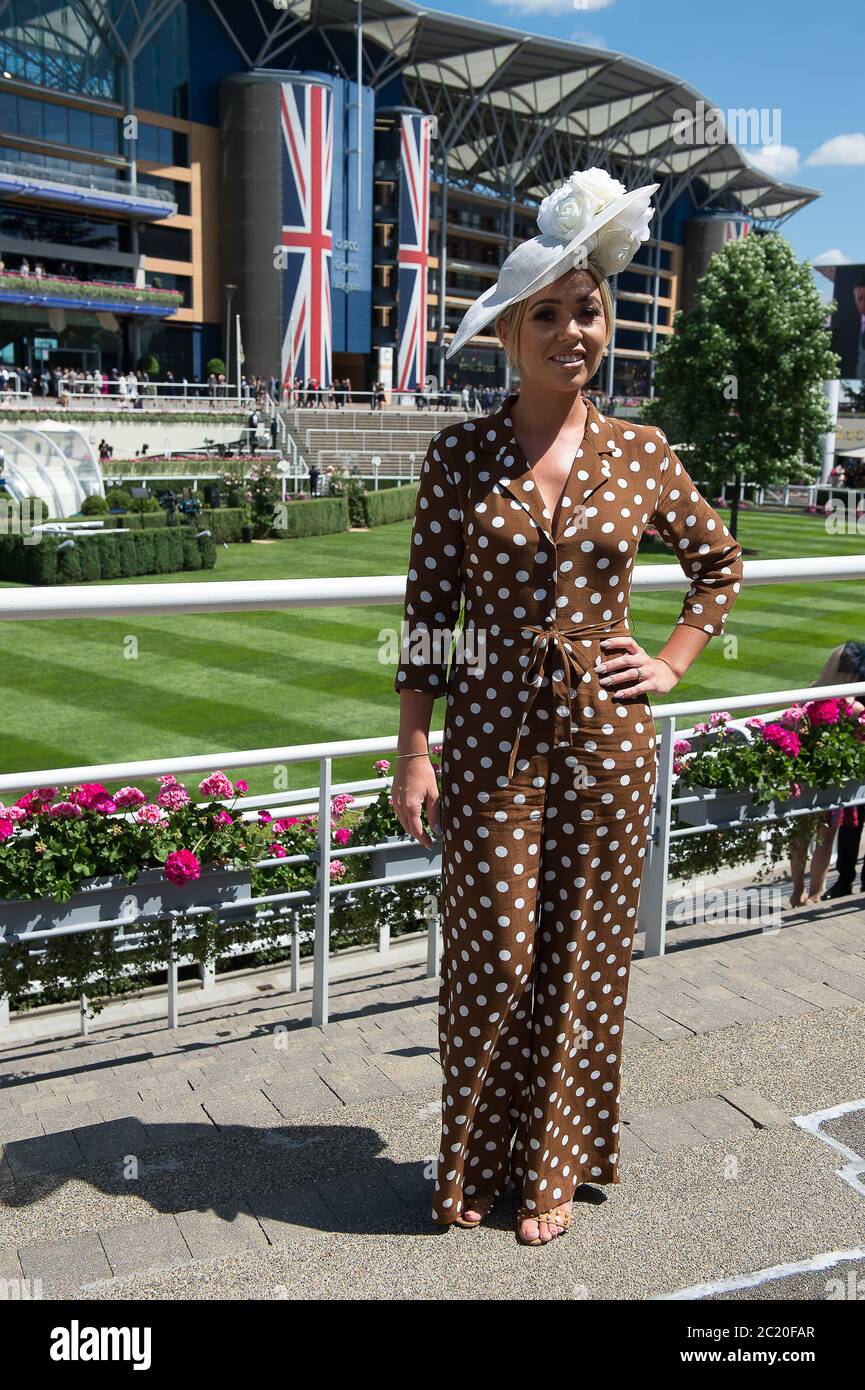 Ascot, Berkshire, UK. 22nd June, 2018. This lady attending Royal Ascot goes with the brown polka dot look made famous by Julia Roberts in the film Pretty Woman. Credit: Maureen McLean/Alamy Stock Photo